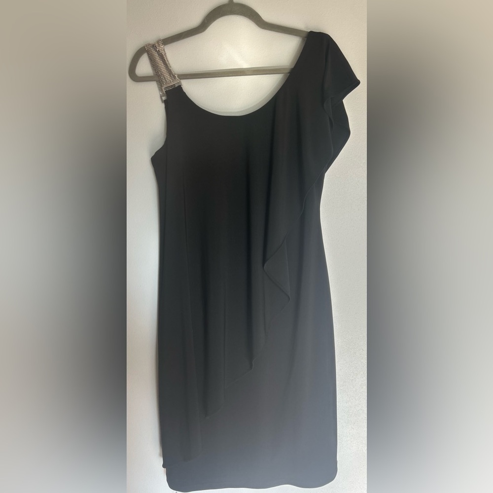 Little black dress with some bling! Perfect for a special occasion.